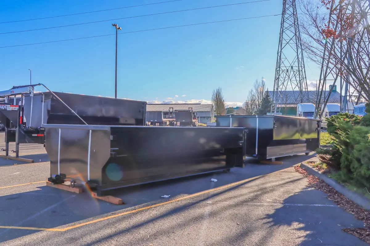 Roll-off dumpster ready for waste disposal at job site for 15 Yard Dumpster Rental in Rowley